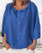 Lös enfärgad skjorta